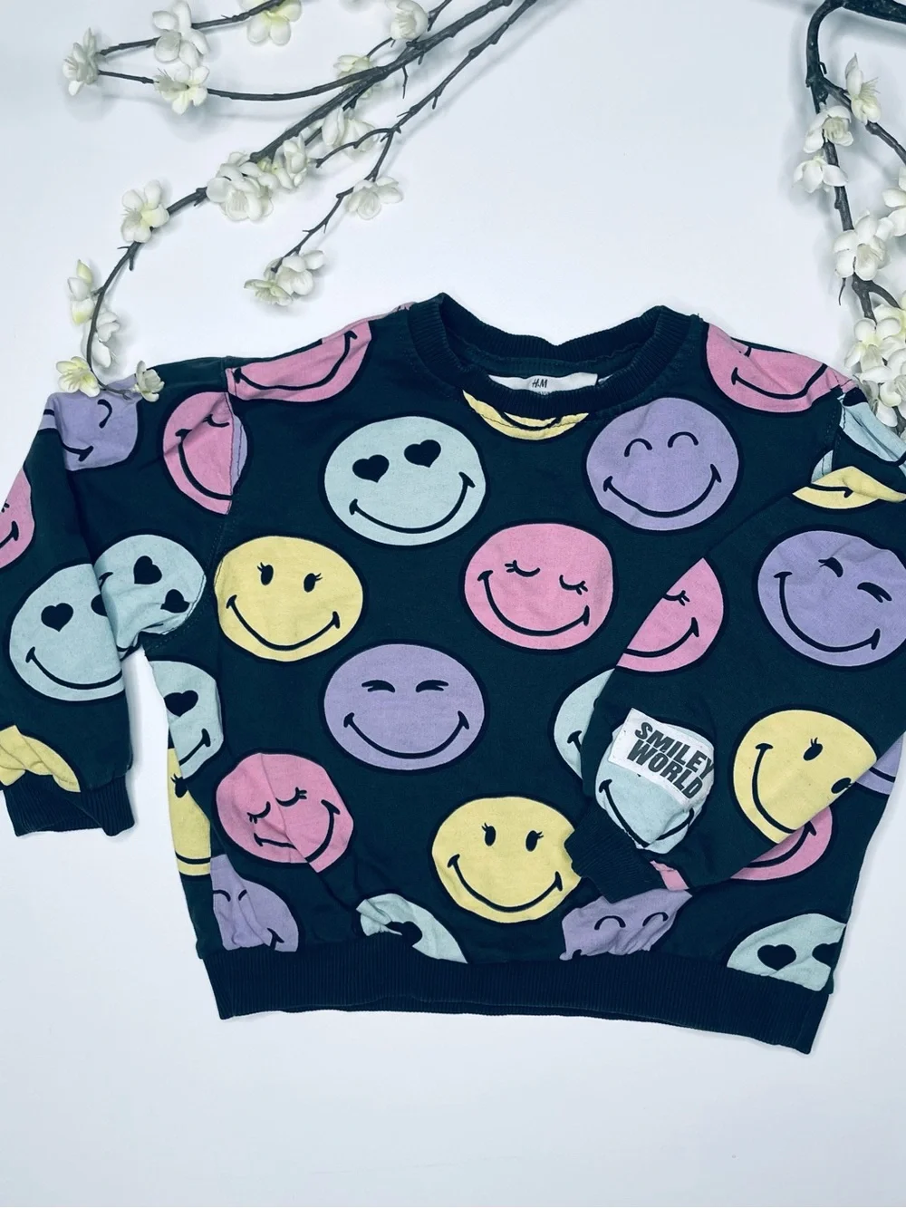 H&M Black Sweatshirt with Pastel Multicolor Smiley Faces